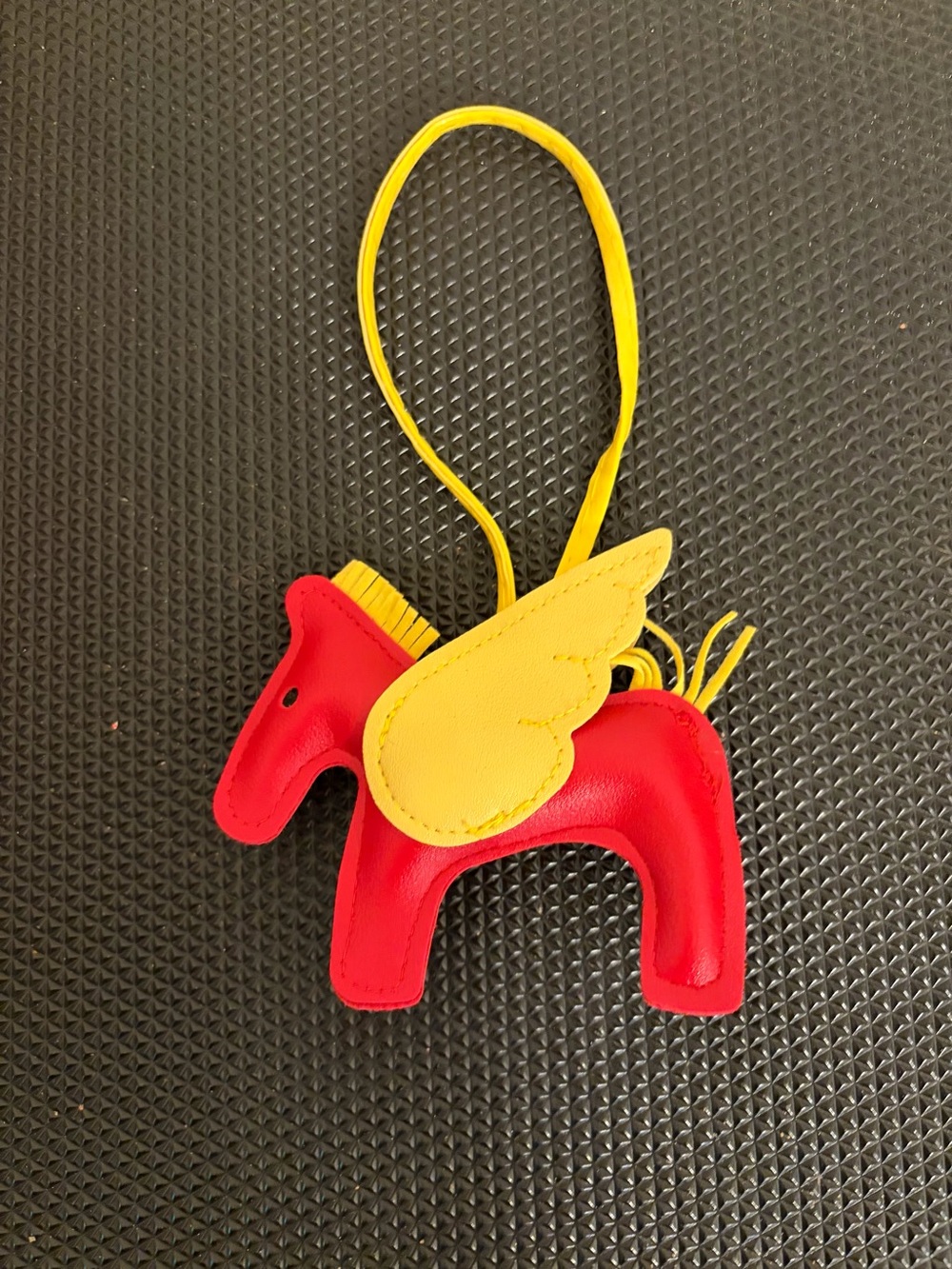 Yellow & Red Winged horse charm for your bag.